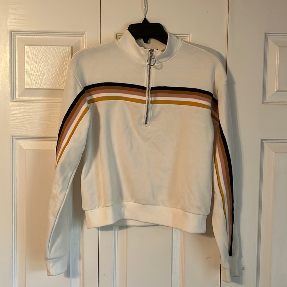 Womens high collared shirt. Zip up front.